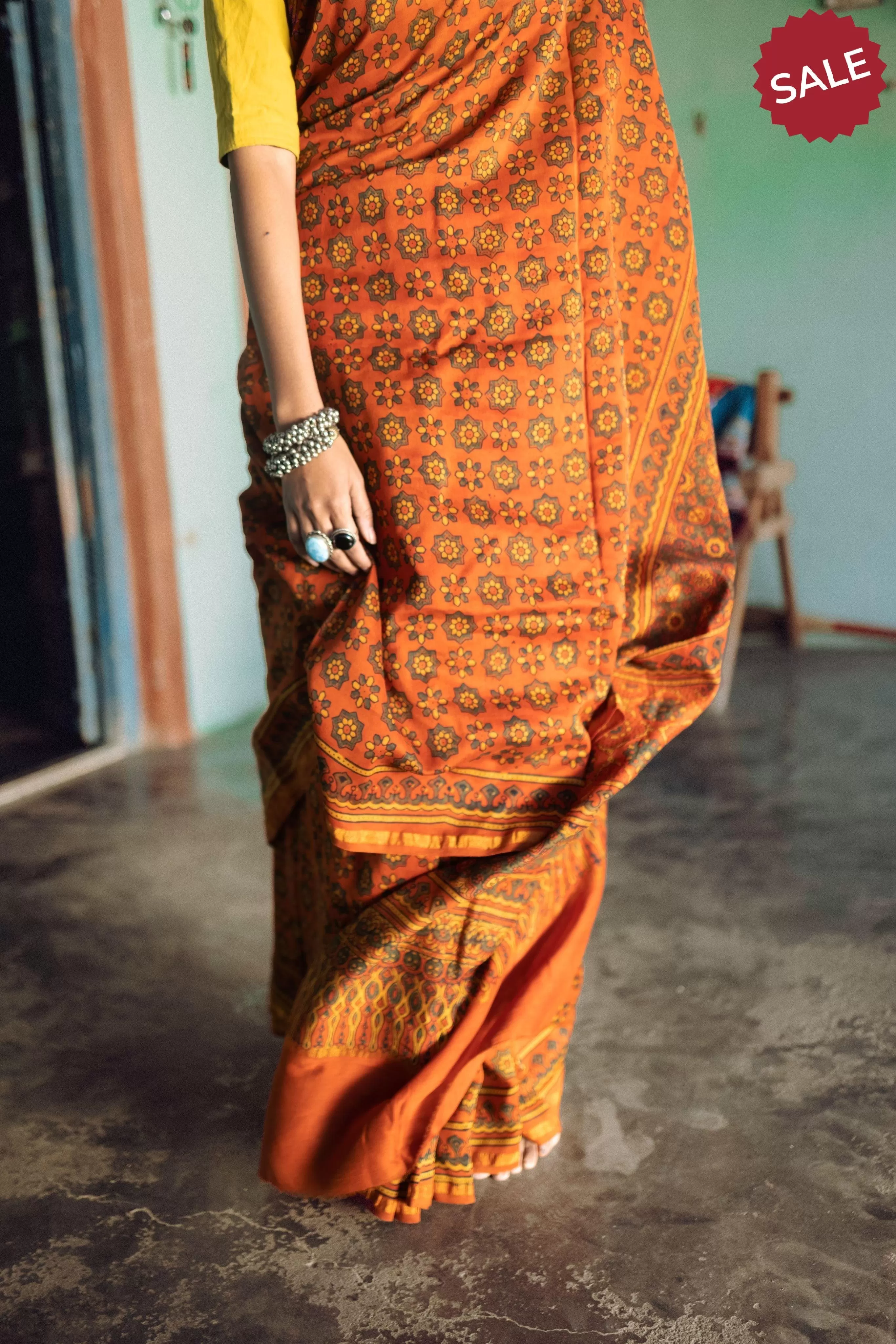 Jharokha -Orange green silk cotton Ajrakh handblockprinted saree